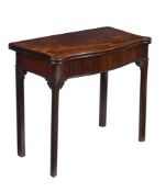 A GEORGE III MAHOGANY SERPENTINE CARD TABLE, IN THE MANNER OF THOMAS CHIPPENDALE