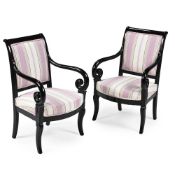 A PAIR OF LOUIS PHILIPPE EBONISED AND UPHOLSTERED FAUTEUILS, MID 19TH CENTURY