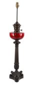 A BRONZE AND CRANBERRY GLASS TABLE OIL LAMP, LATE 19TH CENTURY