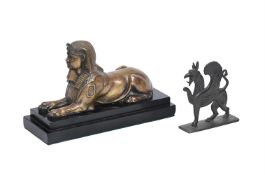A GILT BRONZE MODEL OF A SPHINX, LATE 19TH CENTURY, AND A BRONZE MODEL OF A GRIFFIN