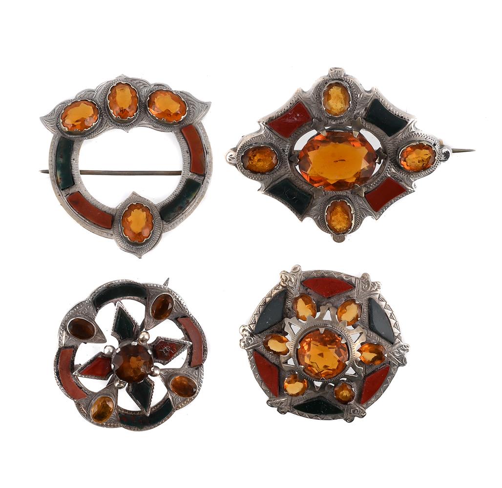 SCOTTISH INTEREST: FOUR VICTORIAN SILVER, AGATE AND PASTE BROOCHES