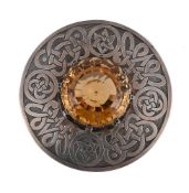 SCOTTISH INTEREST: A LARGE SILVER COLOURED AND CITRINE PLAID BROOCH