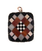 SCOTTISH INTEREST: AN EARLY VICTORIAN FOSSILISED CORAL AND HARDSTONE PENDANT