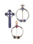 SCOTTISH INTEREST: TWO VICTORIAN SILVER PENANNULAR CLOAK PINS AND A CELTIC CROSS BROOCH