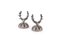 A PAIR OF SILVER COLOURED AND GRANITE SET DEER HEAD MENU HOLDERS