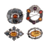 FOUR VICTORIAN SCOTTISH SILVER MONTROSE AGATE AND PASTE BROOCHES