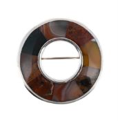 SCOTTISH INTEREST: A VICTORIAN HARDSTONE HOOP BROOCH