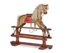 A DAPPLED GREY ROCKING-HORSE, MID-20TH CENTURY