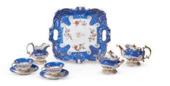 A PARIS PORCELAIN BLUE GROUND AND GILT PART TEA SERVICE