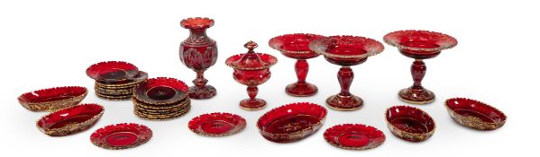 AN EXTENSIVE BOHEMIAN GILDED RUBY GLASS TABLE-SERVICE, MID 19TH CENTURY