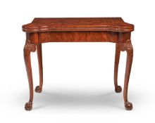 A GEORGE II WALNUT AND BURR WALNUT CONCERTINA-ACTION GAMES TABLE, IN THE MANNER OF BENJAMIN CROOK