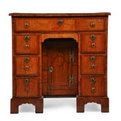 A GEORGE II WALNUT KNEE HOLE DESK, CIRCA 1740