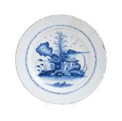 AN ENGLISH DELFT BLUE AND WHITE CHINOISERIE PLATE, CIRCA 1760
