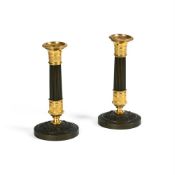 A PAIR OF ORMOLU AND PATINATED BRONZE CANDLESTICKS IN CHARLES X STYLE, 19TH CENTURY
