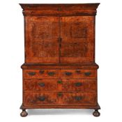 A WALNUT PRESS CUPBOARD, EARLY 18TH CENTURY AND LATER