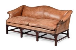 A MAHOGANY AND LEATHER UPHOLSTERED SOFA, IN GEORGE III STYLE, OF RECENT MANUFACTURE