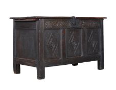 A CHARLES II PANELLED OAK CHEST OR COFFER, CIRCA 1680
