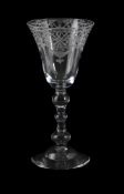 A DUTCH-ENGRAVED BALUSTER WINE GLASS OF 'NEWCASTLE' TYPE, MID 18TH CENTURY