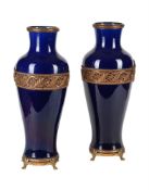 A PAIR OF FRENCH BLUE-GROUND POTTERY AND GILT-METAL MOUNTED SEVRES-STYLE VASES, EARLY 20TH CENTURY