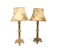 A PAIR OF POLISHED BRASS LAMPS IN CELTIC REVIVAL STYLE, 20TH CENTURY