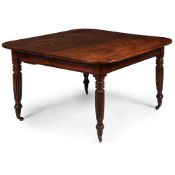 A GEORGE IV MAHOGANY EXTENDING DINING TABLE, CIRCA 1825