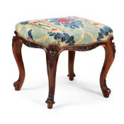 A VICTORIAN WALNUT AND TAPESTRY UPHOLSTERED STOOL, CIRCA 1860