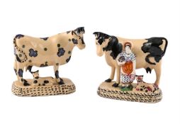 TWO BUFF-COLOURED POTTERY COW AND CALF GROUPS OF YORKSHIRE TYPE, CIRCA 1820