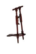 A MAHOGANY BOOTJACK, FIRST QUARTER 20TH CENTURY