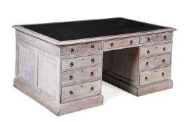 A LIMED OAK PEDESTAL DESK, IN GEORGE III STYLE, 20TH CENTURY