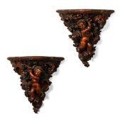 A LARGE PAIR OF CARVED SOFTWOOD WALL BRACKETS CONTINENTAL, LATE 19TH OR EARLY 20TH CENTURY