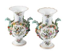 A PAIR OF MEISSEN PORCELAIN BALUSTER FLOWER-ENCRUSTED TWO-HANDLED VASES, LATE 19TH CENTURY