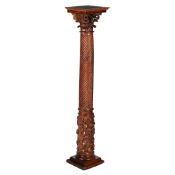 A CARVED AND STAINED OAK COLUMNAR PEDESTAL, PROBABLY CIRCA 1800 AND LATER