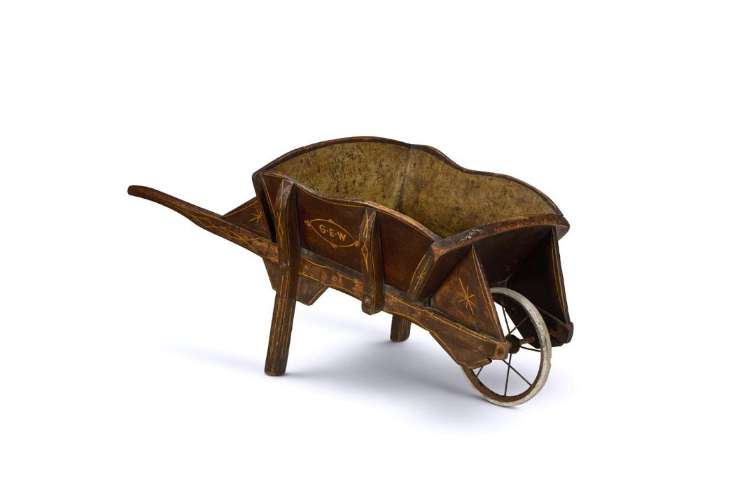 A CHILD'S PAINTED WHEELBARROW, ENGLISH, LATE 19TH/EARLY 20TH CENTURY
