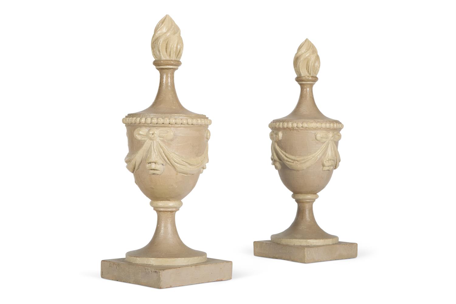 A PAIR OF GREY AND CREAM PAINTED CARVED WOOD FLAMING URNS, NORTH EUROPEAN