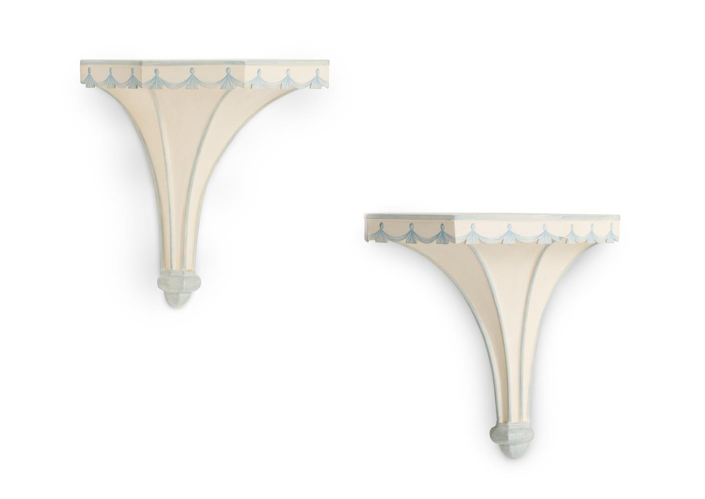 A PAIR OF BLUE AND WHITE PAINTED WALL BRACKETS, BY SIBYL COLEFAX & JOHN FOWLER