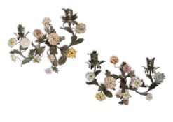 A PAIR OF GREEN TOLE AND PORCELAIN TWIN BRANCH WALL APPLIQUES, FRENCH, 19TH/ EARLY 20TH CENTURY