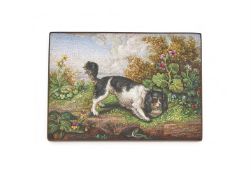 AN EARLY 19TH CENTURY ITALIAN MICROMOSAIC PLAQUE OF A KING CHARLES SPANIEL