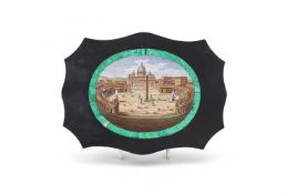 A 19TH CENTURY BLACK MARBLE AND MICROMOSAIC PAPERWEIGHT