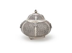 AN INDIAN SILVER PIERCED LOBED CIRCULAR BOX