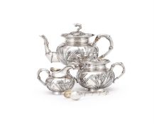 Y A CASED CHINESE SILVER FOUR PIECE TEA SET