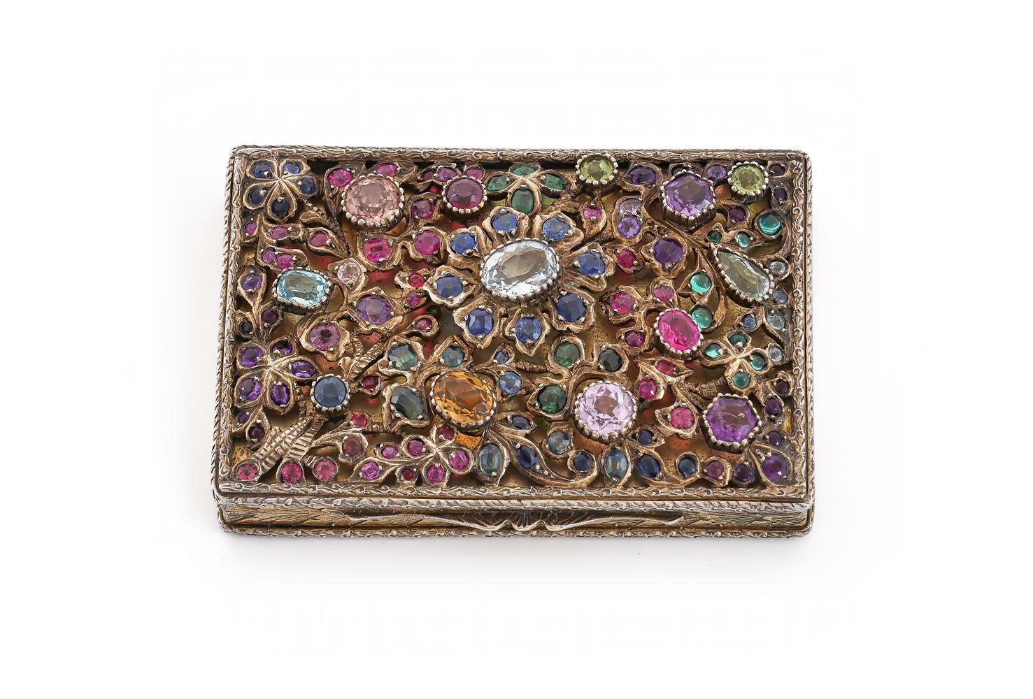 A SILVER GILT AND GEMSET RECTANGULAR COMPACT