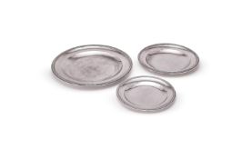 A SET OF THREE FRENCH SILVER GRADUATED CIRCULAR PLATES