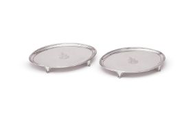 A PAIR OF GEORGE III SILVER OVAL STANDS