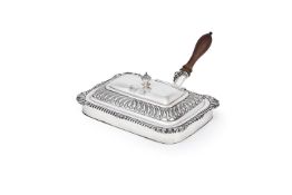 A GEORGE IV SILVER OBLONG CHEESE WARMING DISH