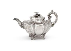 Y A VICTORIAN SILVER SHAPED CIRCULAR TEA POT