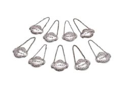 NINE SILVER DECANTER LABELS