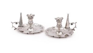 A PAIR OF VICTORIAN SILVER CHAMBERSTICKS
