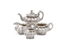 Y A WILLIAM IV SILVER LOBED CIRCULAR FOUR PIECE TEA SET