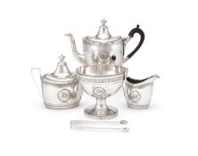 AN AMERICAN SILVER FOUR PIECE OVAL TEA SET