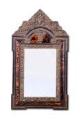 Y A NORTH EUROPEAN TORTOISESHELL, REPOUSSE BRASS AND EBONISED MIRROR